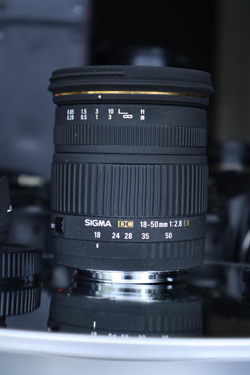 Lens  SIGMA AF 18-50mm F2.8 EX DC Canon EF - Phụ-kiện